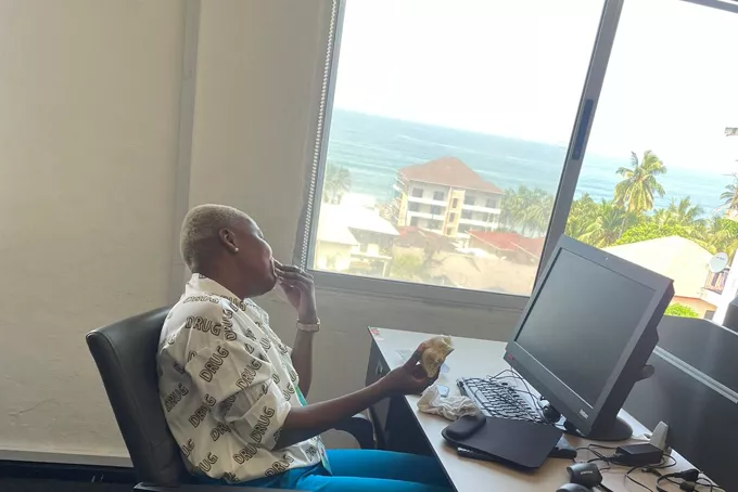 A Kappagee colleague working at the Monrovia office.