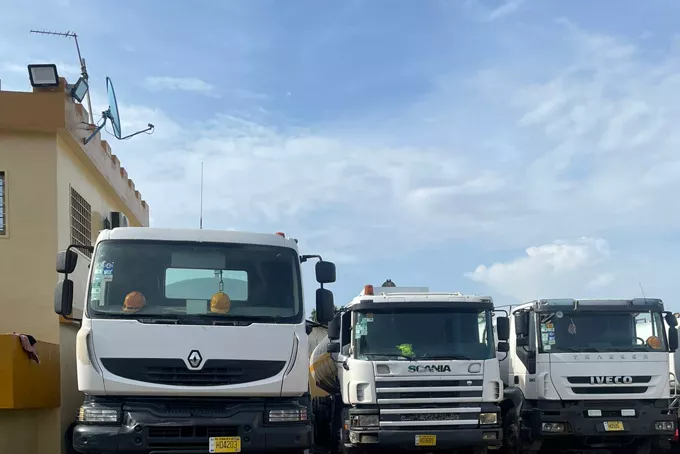 A line of tipper trucks on a customer’s yard.