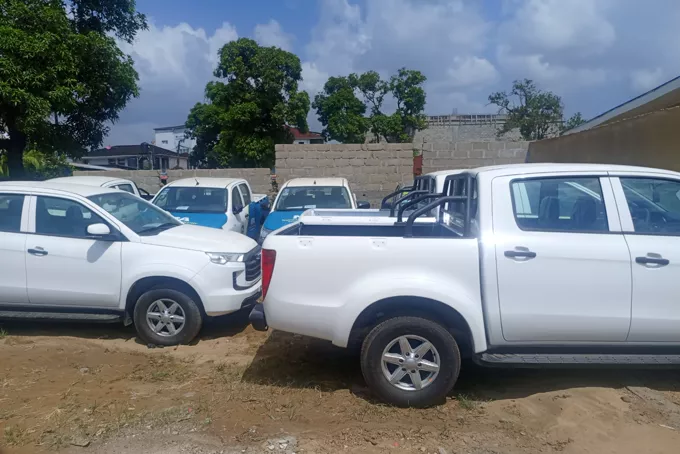 Pickups parked on a yard in Monrovia.
